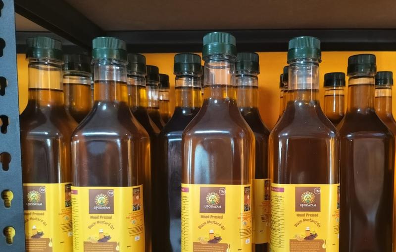 Bottles of wood-pressed oil